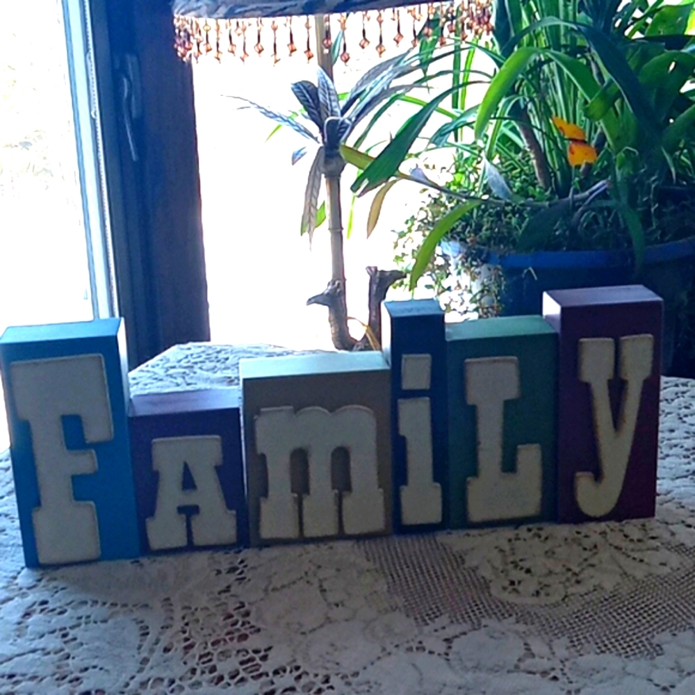 Very nice shelf or mantel family sign. Letters are all separate.